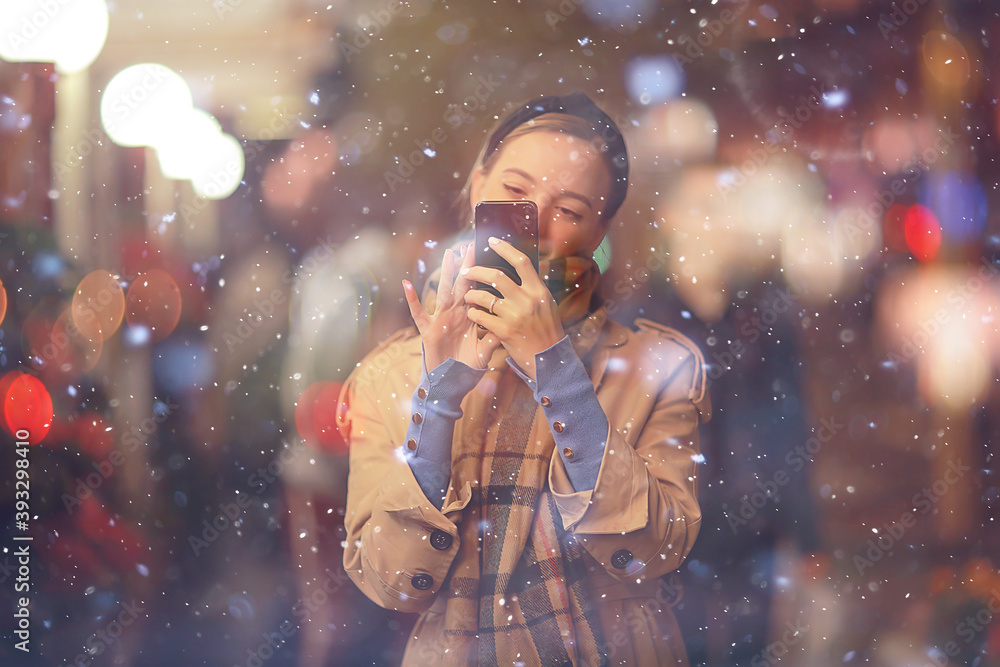 happy girl lights evening christmas shopping standing on the street by the shop window happy girl lights evening christmas shopping standing on the street by the shop window