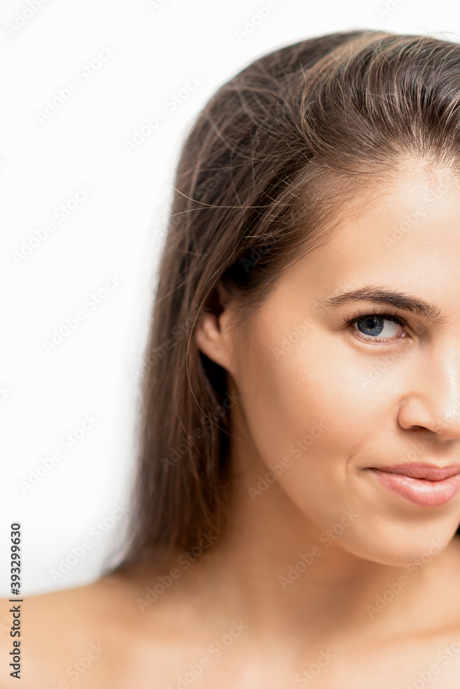 Young caucasian woman beauty face portrait with healthy white skin isolated on white background Young caucasian woman beauty face portrait with healthy white skin isolated on white background