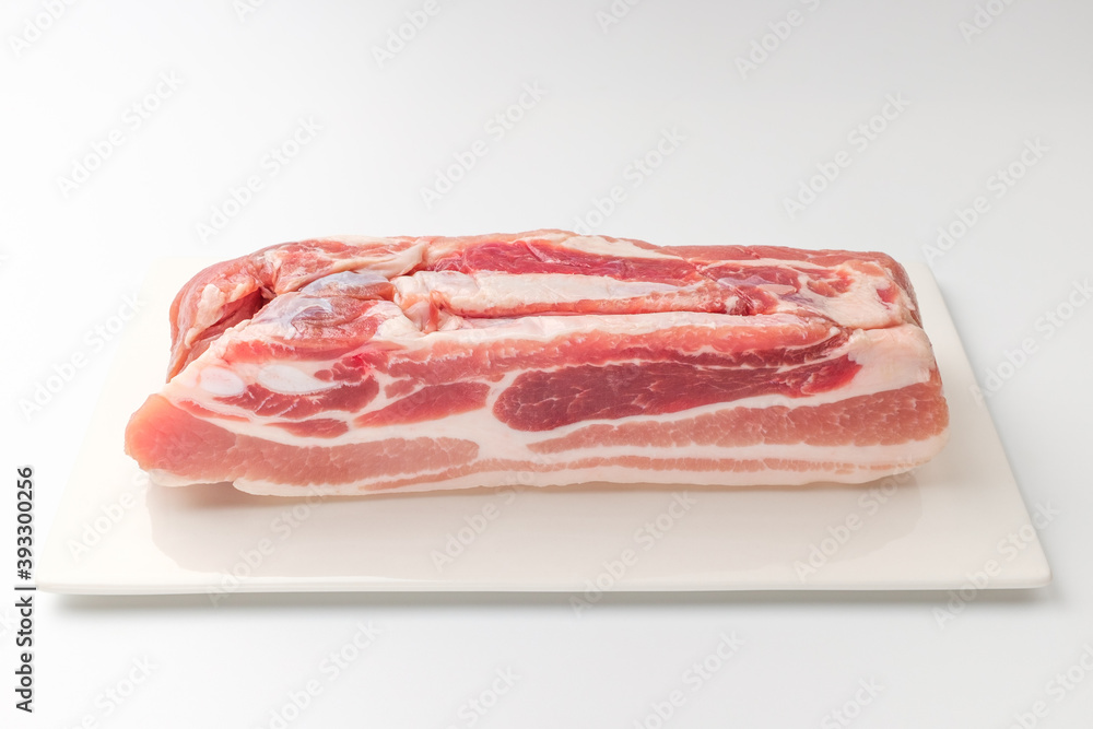 Pork belly on white background