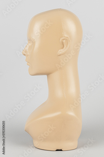Flesh tone mannequin head in profile mockup