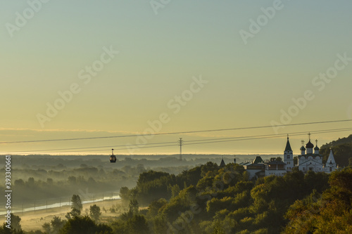 Orthodox Church at Dawn in forest photo