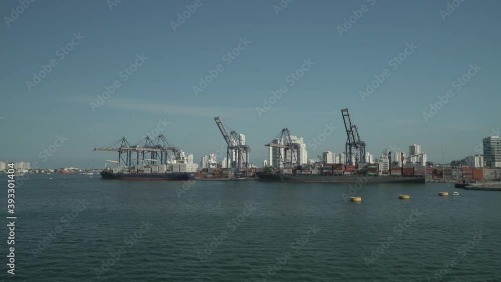 Wide view on port cranes and cargo terminal in Harbor of Cartagena Colombia. Wide view on port cranes and cargo terminal in Harbor of Cartagena Colombia.