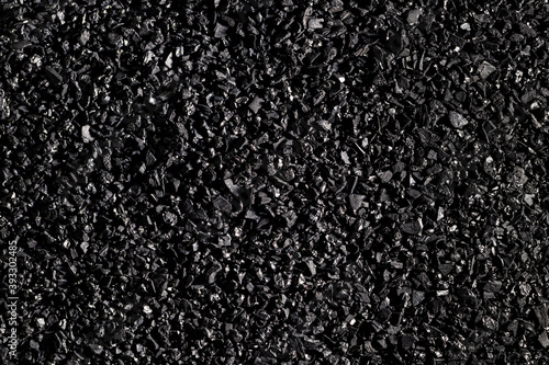 Close-up activated carbon texture. Coconut charcoal.
