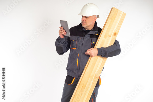 Builder with boards and a t...