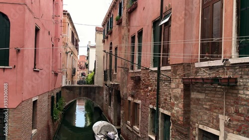 Water channel and old buildings in Venice. Tourism and travelings photo