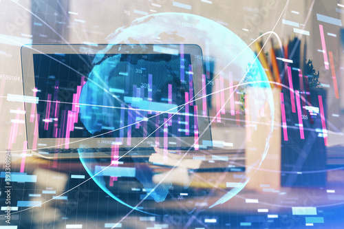 Stock market chart hologram drawn on personal computer background. Multi exposure. Concept of investment.