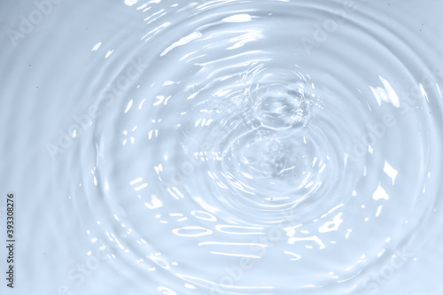 Water drop on clear water wave circle pattern background