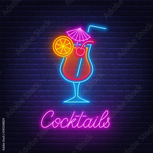 Cocktail Tequila sunrise neon sign on brick wall background .