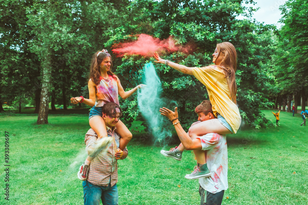 Fototapeta premium young happy friends at holi fest