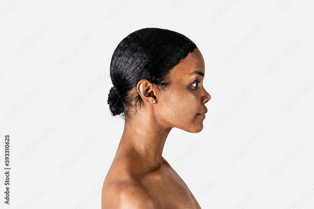Bare chested black woman in a profile shot