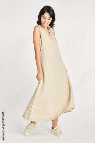 Fotografía Woman in a minimal beige dress mockup