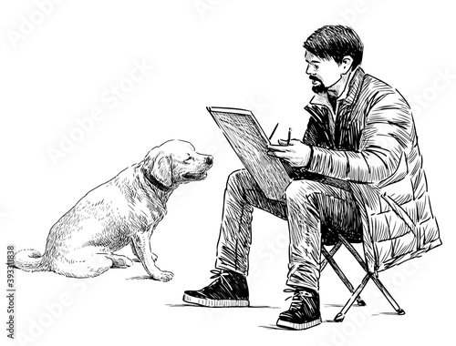 Freehand drawing of street artist sketching big dog