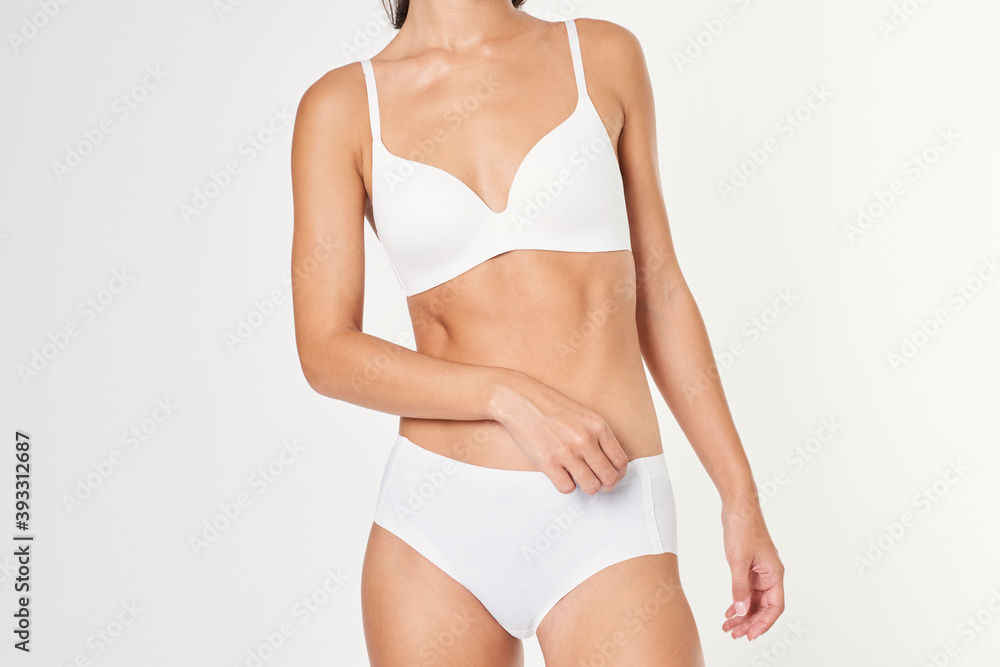 Woman in a white wireless bra and an underwear mockups