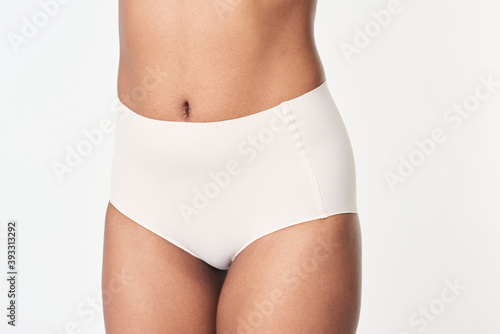Black woman in a white underwear mockup © Rawpixel.com