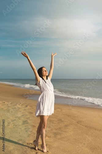 Happy Woman Enjoying Danceing enbraceing the sun