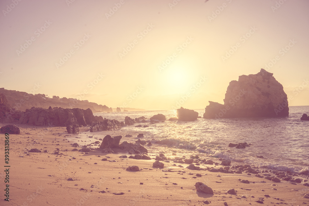 beautiful Atlantic ocean view horizon with sandy beach, rocks and waves at sunrise. beautiful Atlantic ocean view horizon with sandy beach, rocks and waves at sunrise.