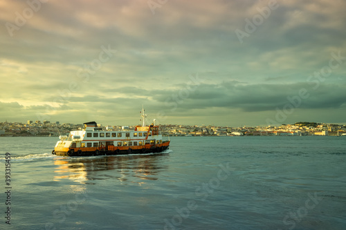 Ferry cruising on the river Tejo near Lisbon Portugal at sunset