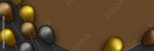 Golden, black and copper foil balloons with threads on brown round background.