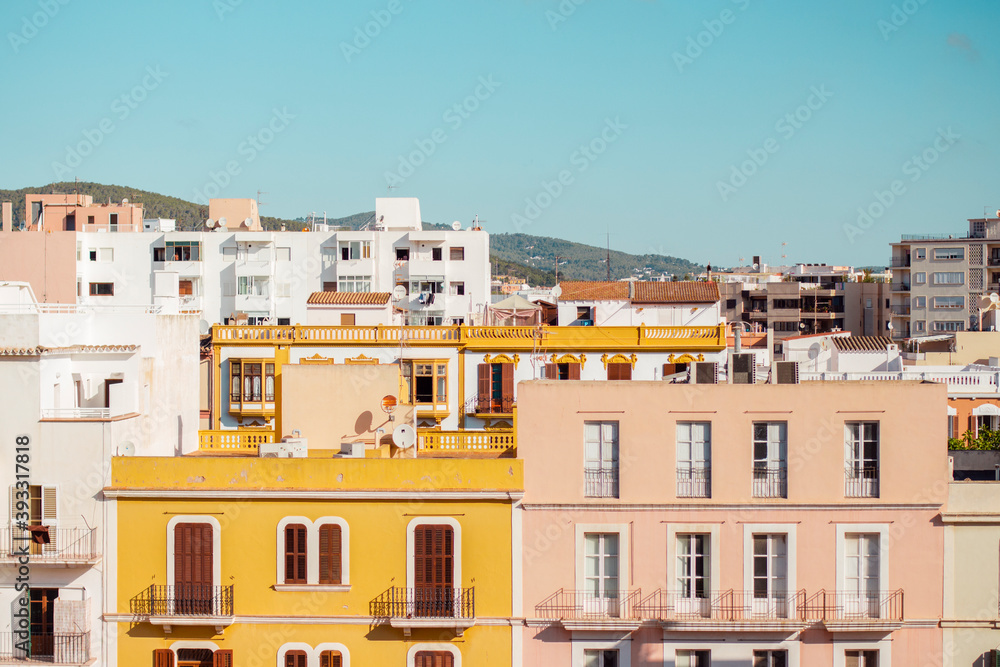 Colorful facades in the cityscape of Ibiza on a sunny day