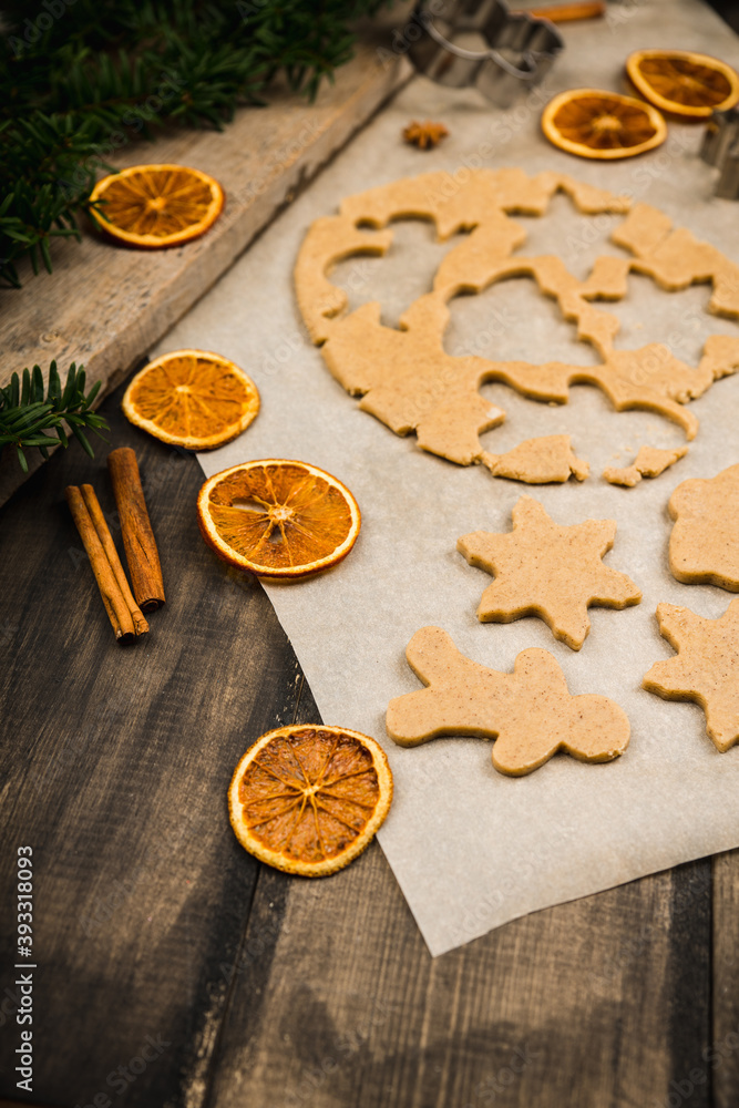 Making gingerbread cookies before Christmas. Christmas traditions. Christmas decorations.
