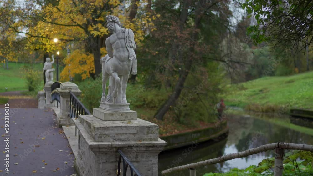 Pavlovsk Park at dusk, St. Petersburg, Centaurs Bridge landmark of Russian culture. High quality 4k footage Pavlovsk Park at dusk, St. Petersburg, Centaurs Bridge landmark of Russian culture. High quality 4k footage