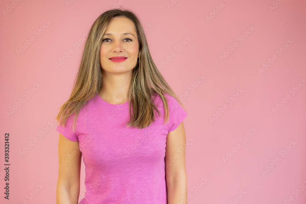 Attractive woman with blonde hair being very glad smiling with broad smile showing her perfect teeth having fun indoors. Attractive woman with blonde hair being very glad smiling with broad smile showing her perfect teeth having fun indoors.