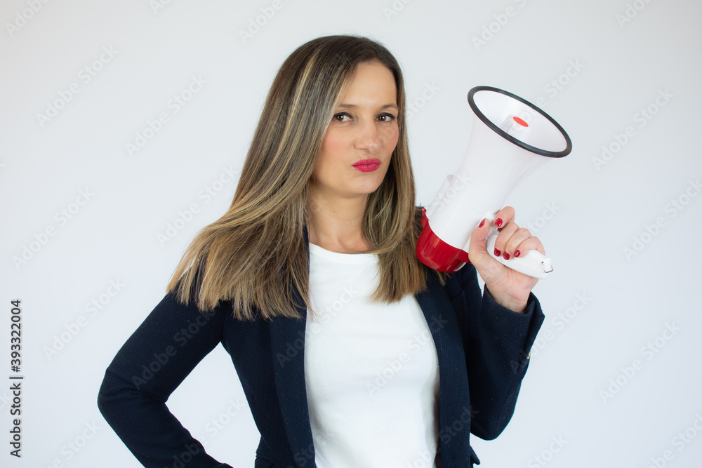 business caucasian woman holding a megaphone over white background. business caucasian woman holding a megaphone over white background.