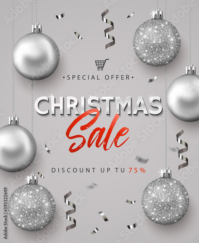 Poster for Christmas Sale. Calligraphic text on the background of silver glitter balls and confetti. Banner or poster for shopping store discount