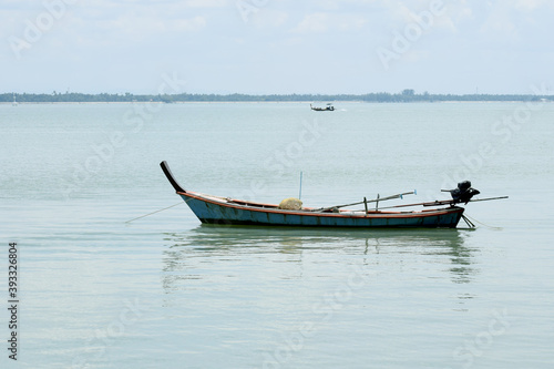 A small boat stationary at sea