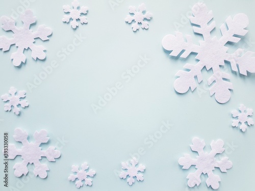 white snowflakes on a blue background