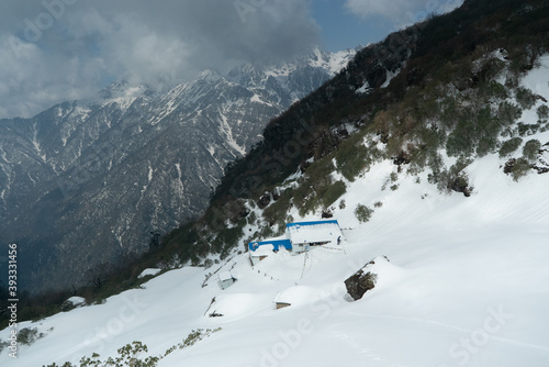 Nepal, Makalu Barun National Park. Nepalese Mountain Shelter covered with snow