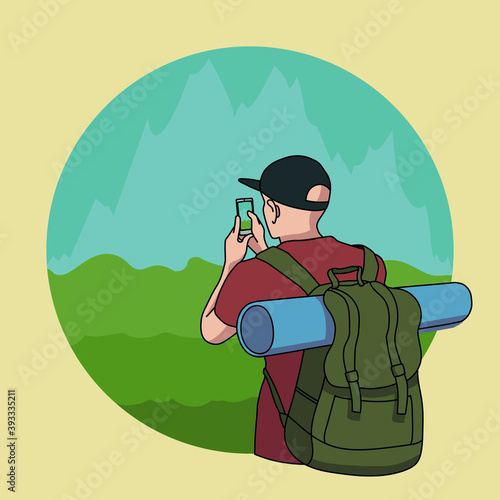The traveler photographs the mountains