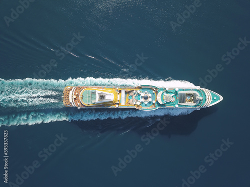 Aerial view large cruise ship at sea, Passenger cruise ship vessel, sailing across the Ksamil, Albania. View from drone. © alzay