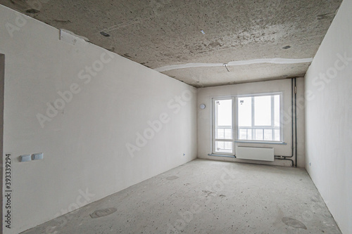 Russia  Moscow- April 17  2020  interior room apartment rough repair for self-finishing. interior decoration  bare walls of the premises  stage of construction