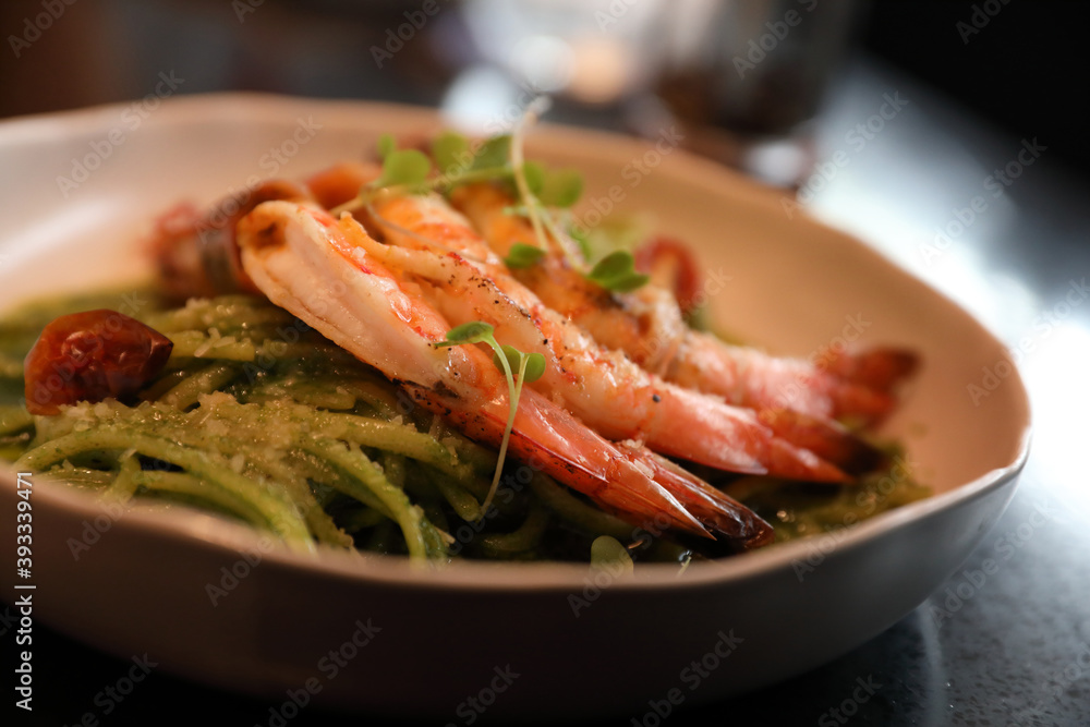 spaghetti pesto sauce with grilled shrimps italian food spaghetti pesto sauce with grilled shrimps italian food