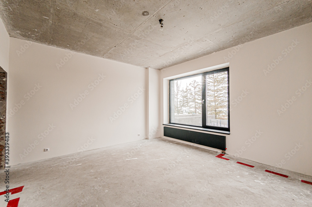 Russia, Moscow- April 17, 2020: interior room apartment rough repair for self-finishing. interior decoration, bare walls of the premises, stage of construction Russia, Moscow- April 17, 2020: interior room apartment rough repair for self-finishing. interior decoration, bare walls of the premises, stage of construction