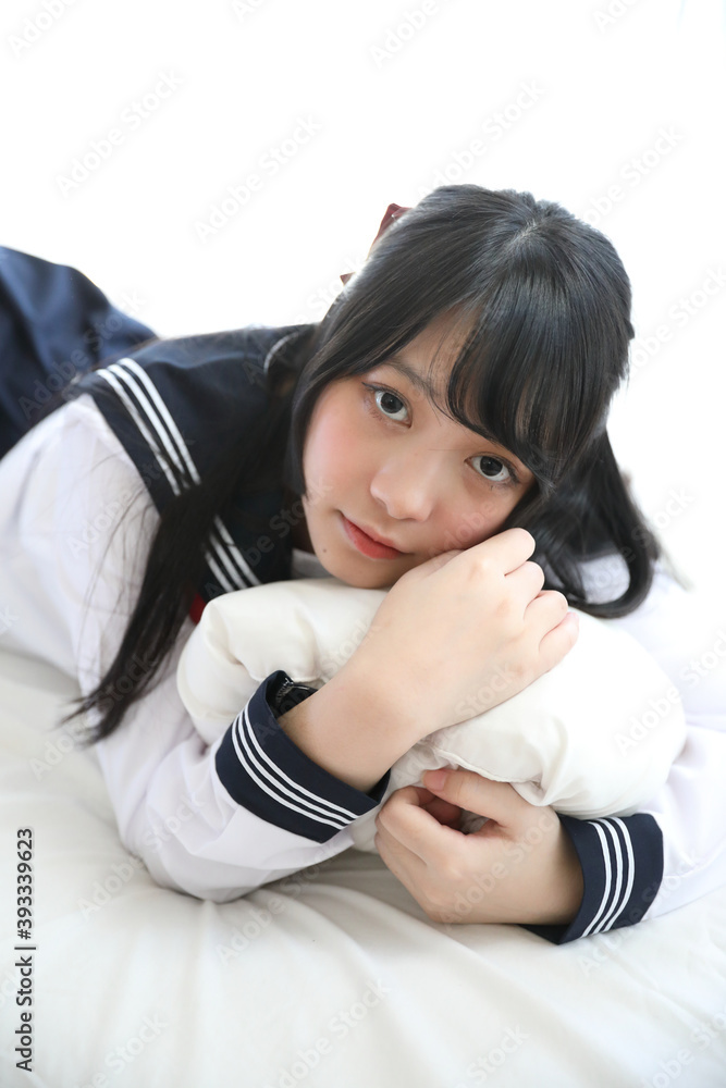 Portrait japanese school girl sleeping in white tone bed room Portrait japanese school girl sleeping in white tone bed room