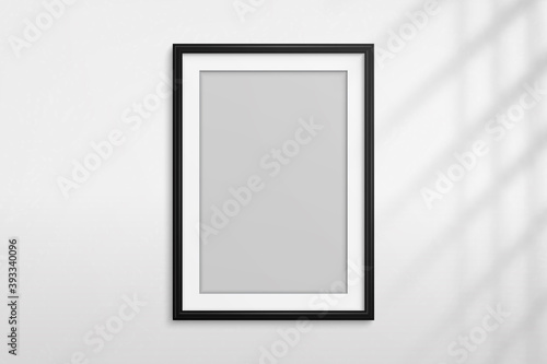 Mockup black frame photo. Shadow on wall. Mock up artwork picture framed. Vertical boarder. Empty board a4 photoframe. Modern stylish 3d border for design prints poster, blank, painting image. Vector