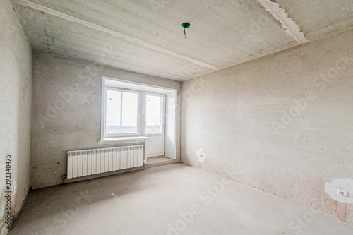 Russia  Moscow- April 17  2020  interior room apartment rough repair for self-finishing. interior decoration  bare walls of the premises  stage of construction