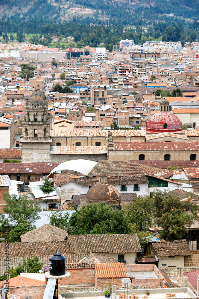 Cityscape view of Cajamarca, Peru from Apolonia hill church dome and tower. Roof tiles and colonial buildings.