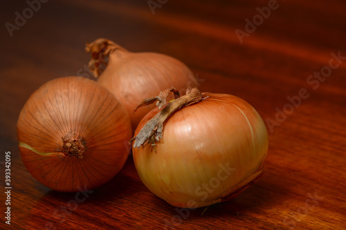 closeup of onions on wooden background