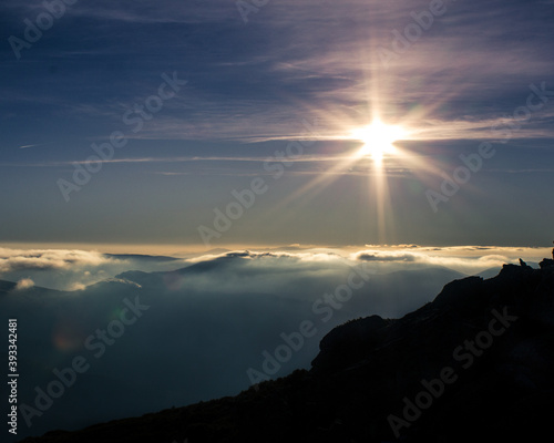 Beautiful light blue sky, beauty and Clouds at sunset in the mountain, the rays of the sun break through the clouds. Natural