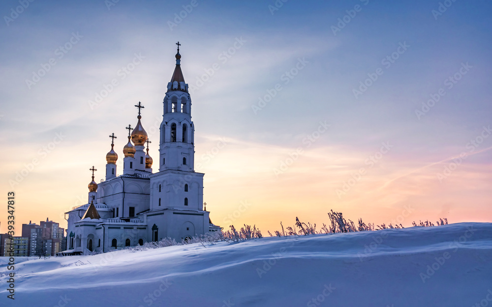 Church of the saints and God's builders at sunrise against the backdrop of a clear sky and withered grass 3