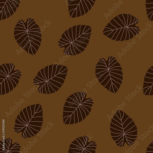 Autumn leaves doodle silhouettes seamless pattern. Brown foliage. Fall random botanic backdrop.