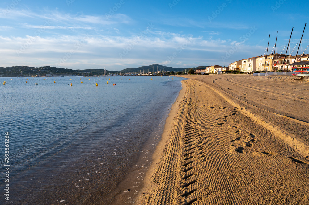 Sandy beach of Port-Grimaud, Gulf of Saint-Tropez in summer, Var, French Riviera, France Sandy beach of Port-Grimaud, Gulf of Saint-Tropez in summer, Var, French Riviera, France