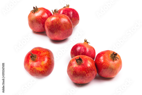 Sweet pomegranate isolated on white background.