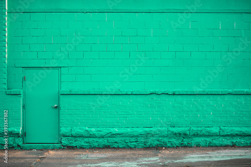 Abstract Brick Wall and Door With Room for Copy With Colorful Bright Tones in Industrial and Urban Feel