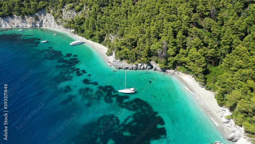 Aerial drone video of breathtaking secluded turquoise beaches of Ftelia and Megalo Pefko in island of Skopelos, Sporades, Greece Aerial drone video of breathtaking secluded turquoise beaches of Ftelia and Megalo Pefko in island of Skopelos, Sporades, Greece