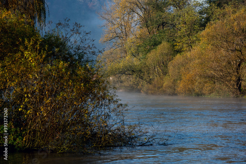 fog over the river in autumn