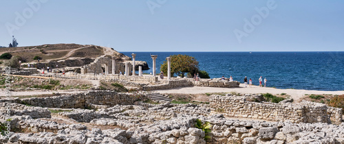 The ruins of the Chersonesos Taurica, Sevastopol, Crimea. Tourists visiting the sights. photo